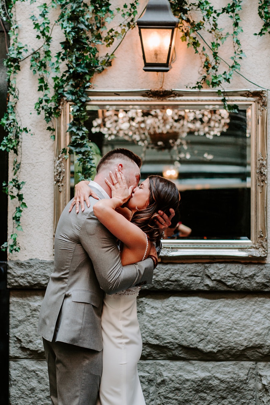 bride and groom kissing passionately