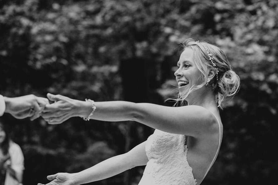 bride smiling while dancing 