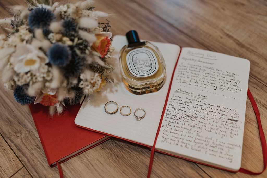 Samantha hand-wrote her vows into a red notebook for her elopement ceremony