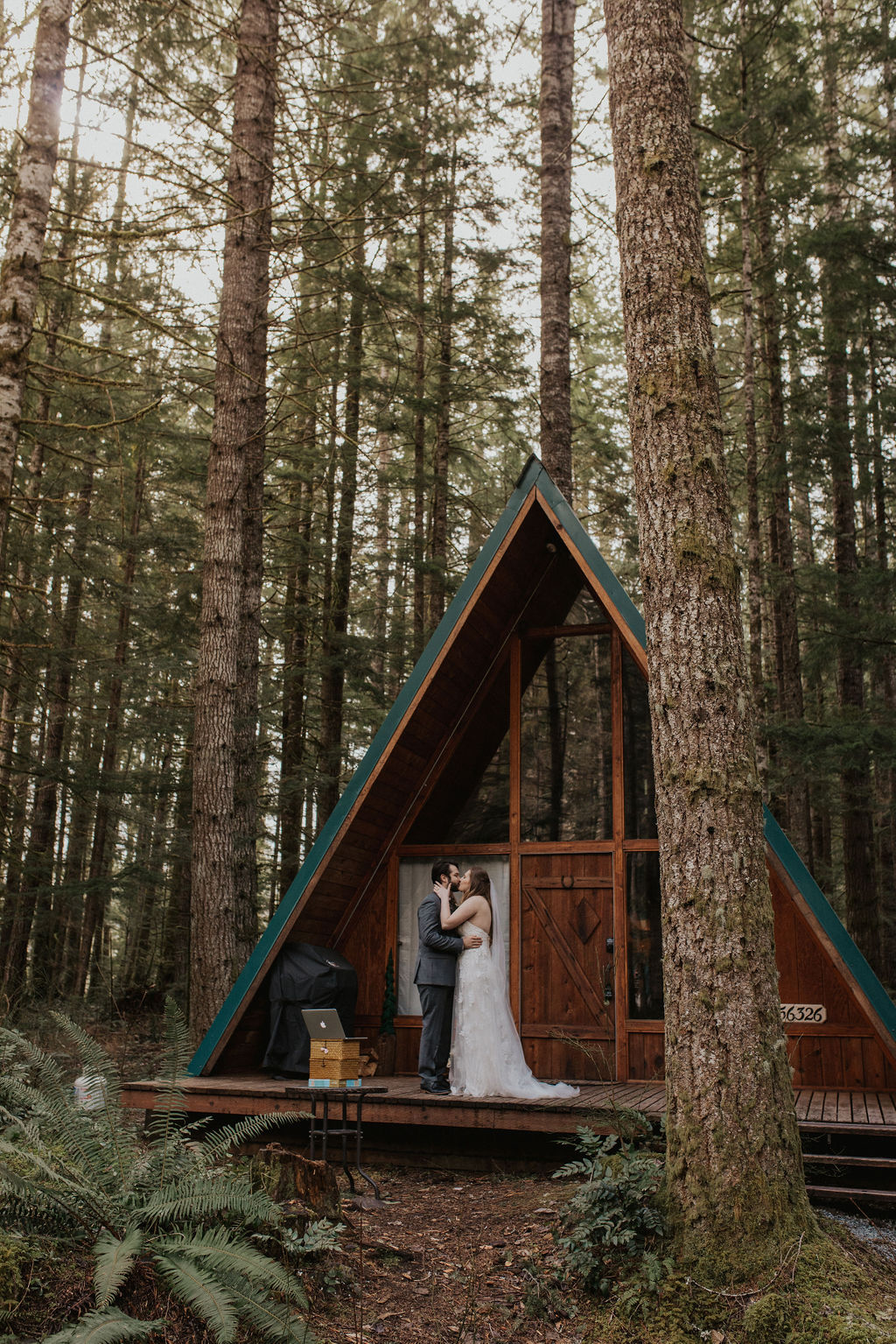 first kiss elopement ceremony a-frame cabin